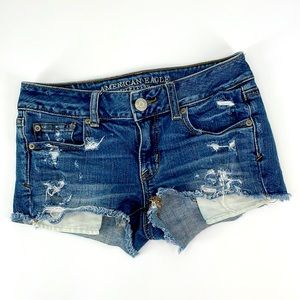 American Eagle Shortie Denim Blue Jean Shorts Distressed Raw Hem Women's 0